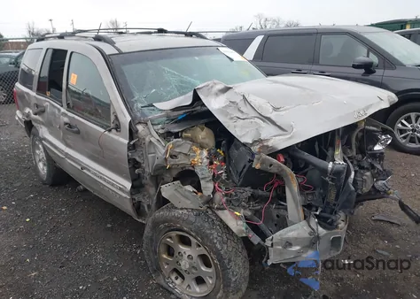 2000 Jeep Grand Cherokee Laredo from USA, damaged, VIN 1J4GW48S4YC213838